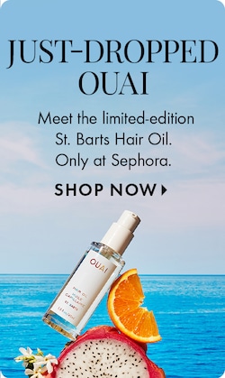 NOUVEL ARRIVAGE OUAI | Voici l’huile pour les cheveux St. Barts en série limitée. Exclusivité Sephora. MAGASINER &gt; | Image de l’huile pour les cheveux St. Barts de Ouai sur un fruit du dragon et une tranche d’orange.