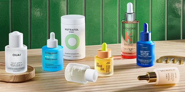 Image of scalp products on a wooden table.