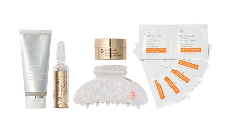 Complete your routine with this set, including a cleanser, lip formula, moisturizer, and peel pads. Plus, receive a branded claw clip