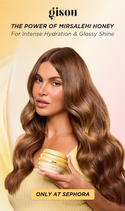 gisou. the power of mirsalehi honey. for intense hydration & glossy shine. Image of model holding product. only at sephora.