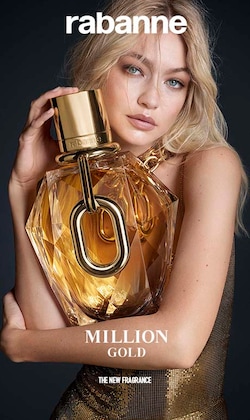 Rabanne. Million Gold. The New fragrance. Image of model holding fragrance bottle.